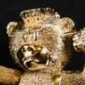 Travis (Gold)